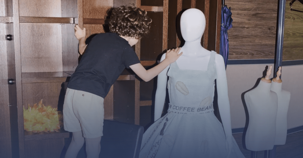 Young fashion designer Max Alexander working with fabric during the creation process