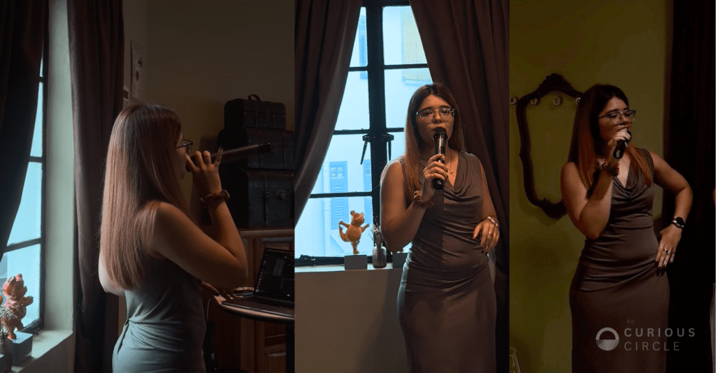 Singer songwriter Nazreen Coupland performing live during The Curious Circle gathering.
